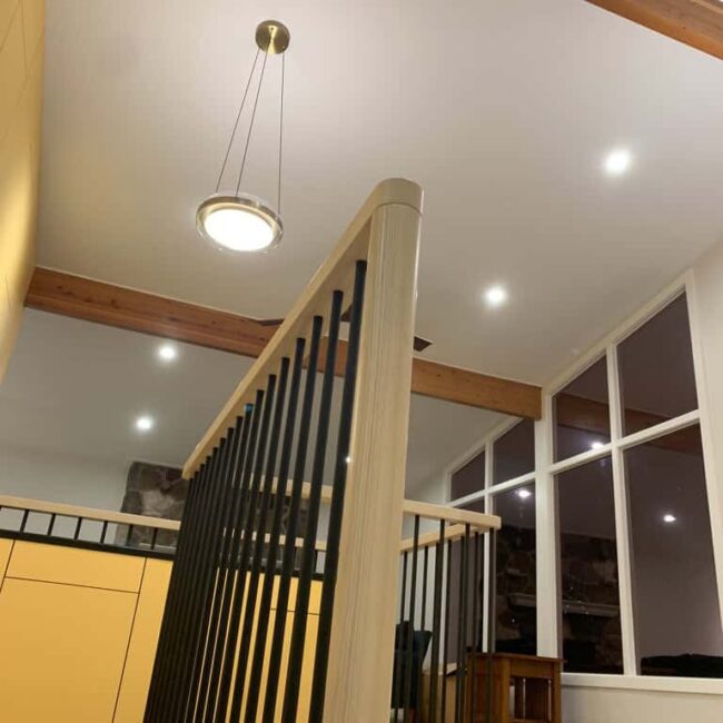 bonus room in a house with tall windows