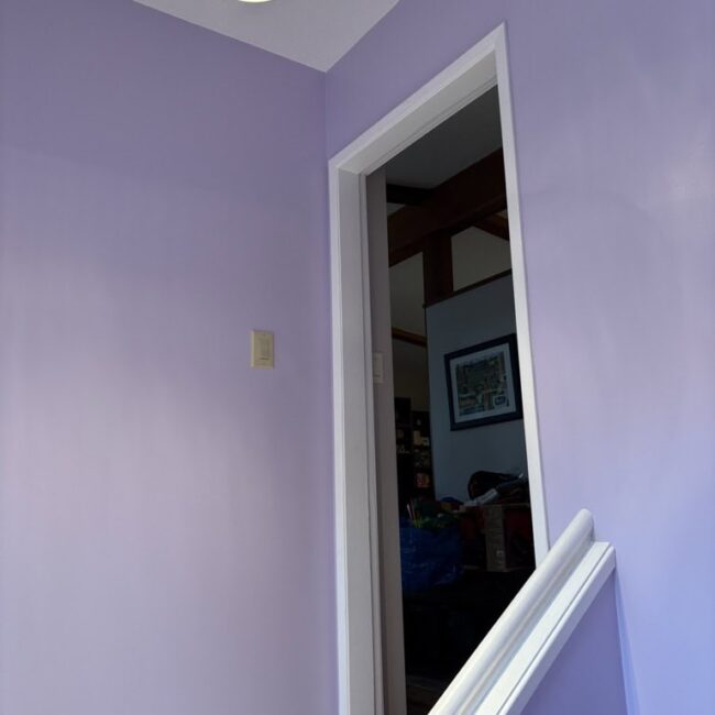 stairwell with purple walls