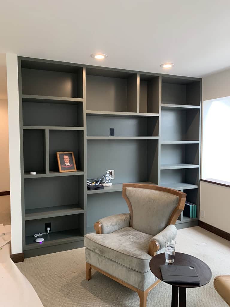 newly painted bookshelf in a living room