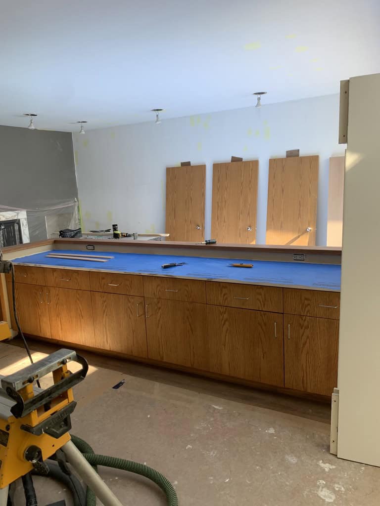 a kitchen with a blue counter top