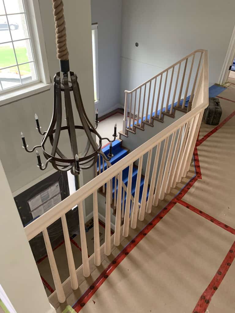 Stairwell before being painted a new color