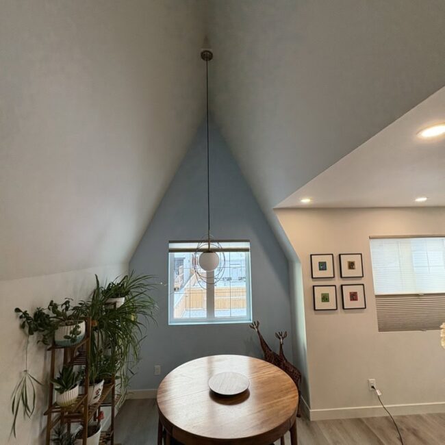 a room with a table and a window
