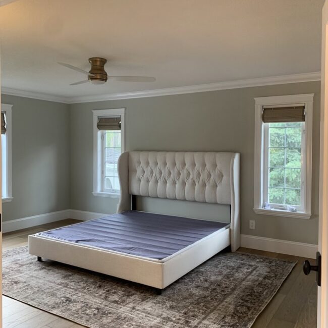 master bedroom with light green walls