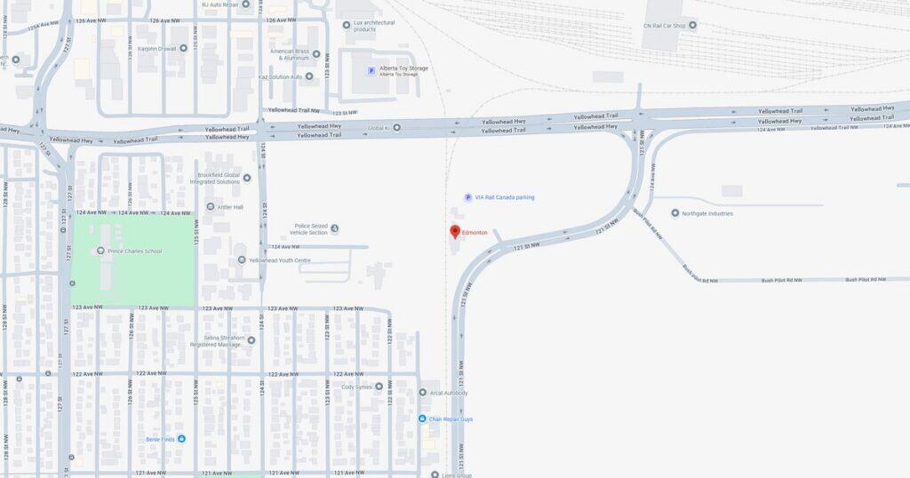 A map showing a suburban area with roads, a park, and a nearby highway, highlighting local streets and green spaces.