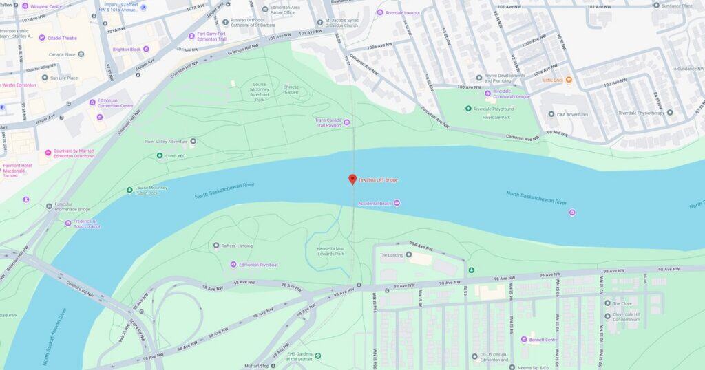 Map showing Riverside Park, bridge, and surrounding city streets along the river. Ideal for urban park and transportation location reference.