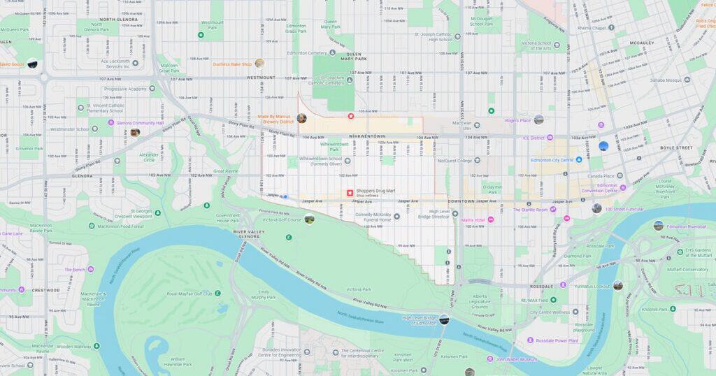 Detailed city map showing streets, parks, and a river with various landmarks and transportation routes.